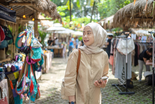 Muslim Woman Exploring Outdoor Market in Bali