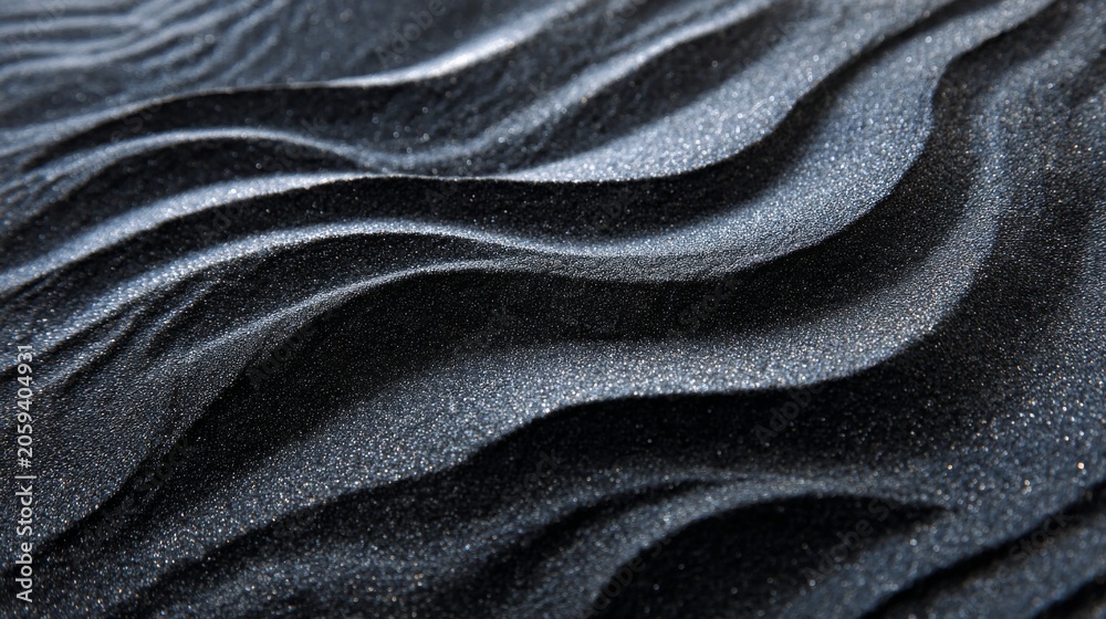 Fototapeta premium Black sand beach macro texture background with natural ocean wave patterns, dark volcanic sand surface, abstract coastal landscape detail, luxury nature backdrop, organic beach texture for design and 