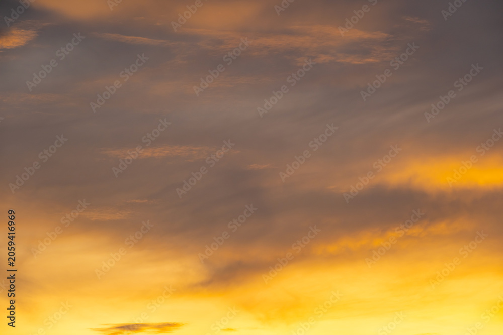 Fototapeta premium Enjoy a panoramic view of the skyline. The sun rises in the morning sky with colorful clouds. and beautiful cloud patterns In the soft light of the morning 