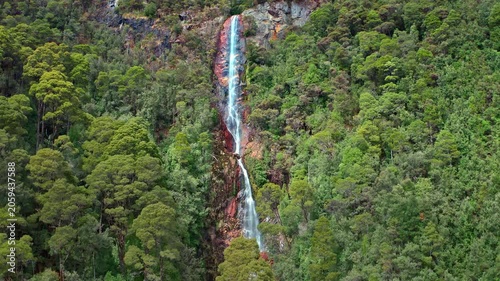 Waterfall mountain landscape. Tasmania travel background aerial view