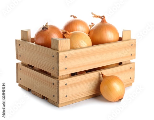 Onions in a wooden crate.