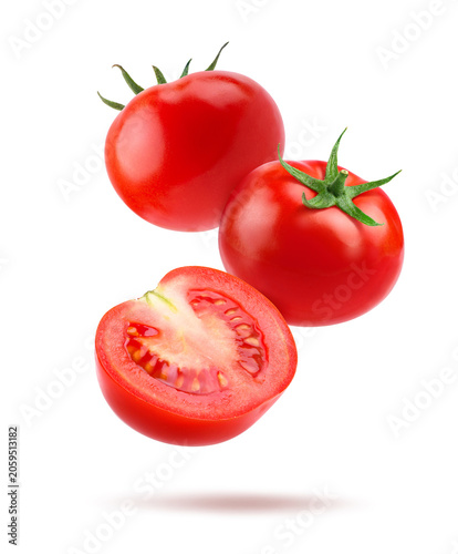 Tomato with halve isolated on white.