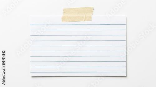 Blank lined index card with masking tape isolated on white background