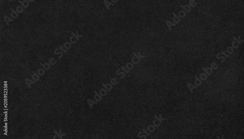 Black handmade paper texture with subtle vertical linear pattern. Abstract background ideal for graphic design, branding, and creative projects.