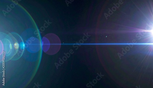 Bright light flare on dark background, circles