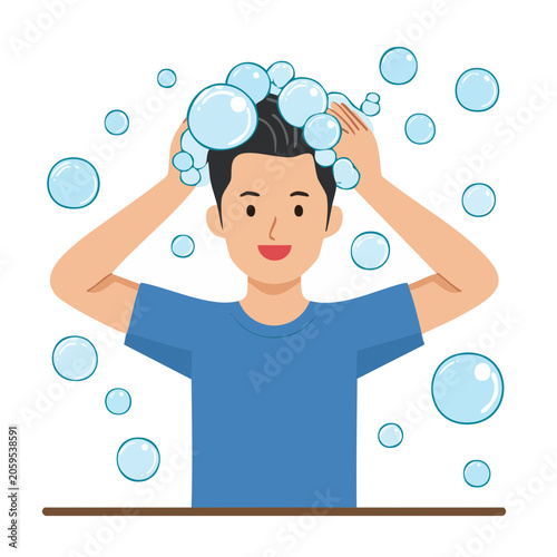Man washing hair with shampoo and bubbles