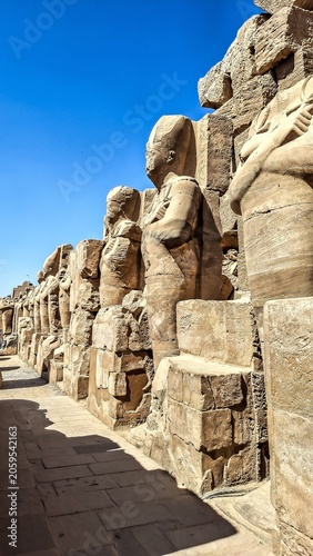 The Karnak Temple Complex, commonly known as Karnak near Luxor, Egypt. Osirid statues.