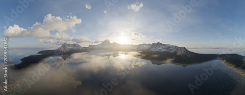 Obraz na plátně Sunrise Over Snowy Mountain Range With Mirror-Like Lake Reflection — 3d Renderin