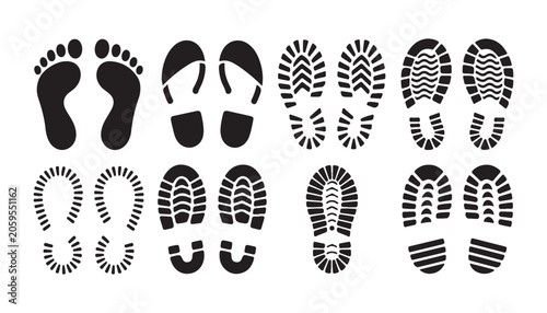 Fotografie Comprehensive variety of black footprints including footwear and bare feet for creative web designs