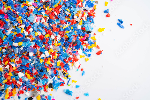 Tableau sur toile Plastic colorful pieces recycling shredded for industrial use.