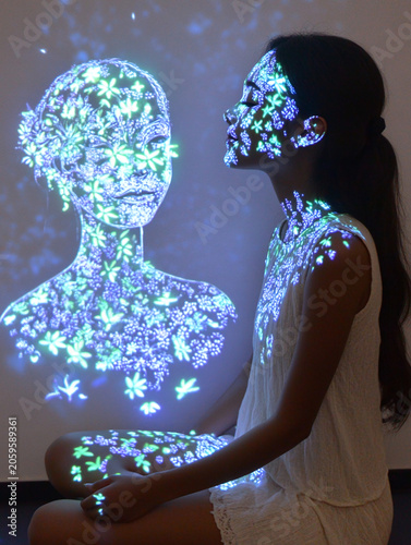 Interactive Digital Art Projection on Woman in Dark Gallery with Futuristic Light Effects