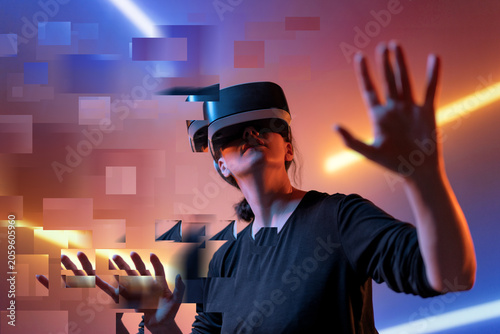 Futuristic Woman Immersed in Virtual Reality with Digital Glitch Effects