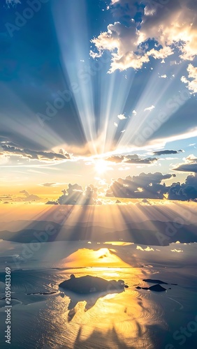 Sunrise over clouds with sun rays.