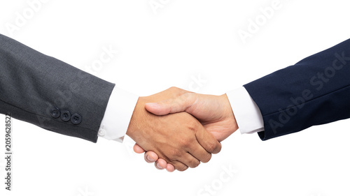Obraz na płótnie Two people in suits shaking hands against a white background.