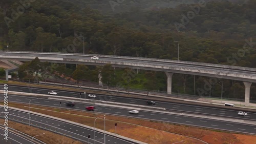 Aerial drone view of vehicles using the newly opened M7 -M12 Interchange at Cecil Hills, Sydney, NSW Australia on the morning of 14 June 2026