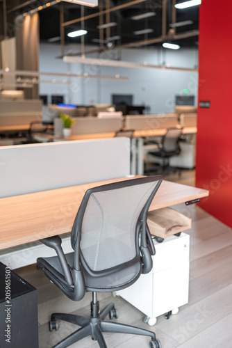 tidy workstations in modern open plan office space