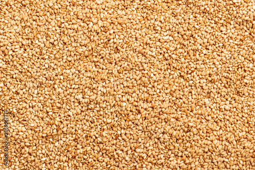 Canvastavla Golden sesame seeds with textured surface