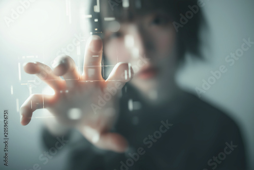 Asian Female Developer Reaching Out Hand To Touch Virtual Reality Screen Glow Interface