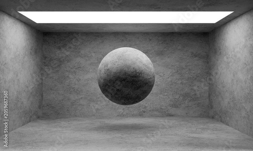 Concrete sphere floating in empty gray room