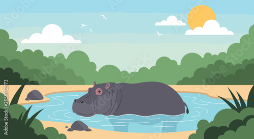 Grey hippopotamus resting in shallow water hole on sandy beach with rocks and green grass under blue sky.