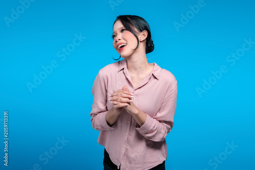 Happy Indonesian Woman Looking Away and Smiling