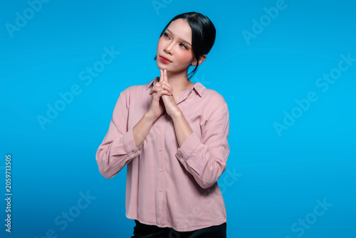 Thoughtful Indonesian Woman Looking Up