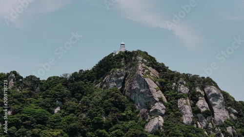 Drone view of lighthouse on Okinoshima Island in Japan