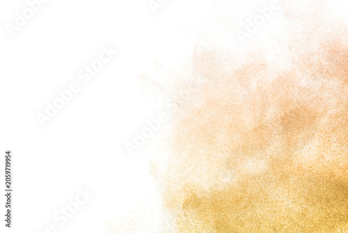 Bild auf Leinwand Abstract golden powder explosion isolated on white background with floating dust particles