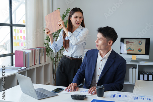 Quadro su tela Workplace conflict between colleagues, an angry businesswoman confronting a male