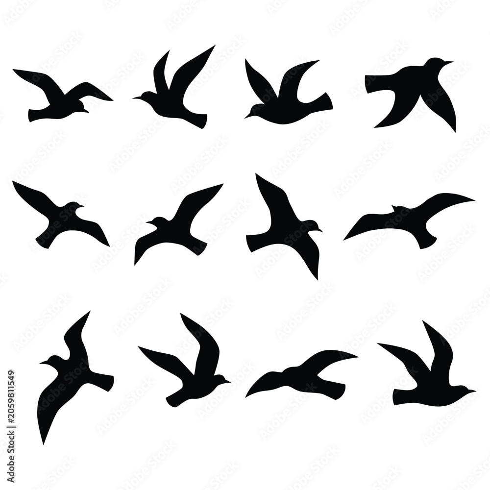 Obraz premium Black bird silhouettes in flight against a white background simple avian vector illustration
