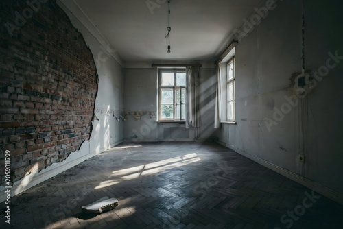 Empty and liminal interior of an abandoned house
