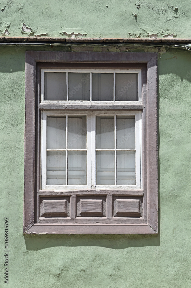 Fototapeta premium Old Spanish Timber Window in Close Up