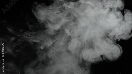 Abstract Smoke Plume Wisps Rising and Swirling on Black Background