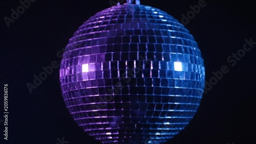 Rotating Disco Ball with Blue and Purple Lights