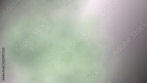 Emerald falling tendril ink diffusion blooming in water 4K loop