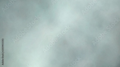 Amber rising cloud ink diffusion blooming in water 4K loop
