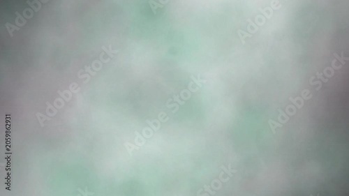 Emerald falling tendril ink diffusion blooming in water 4K loop