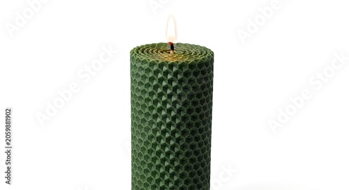 Handmade textured green beeswax pillar candle with honeycomb handmade isolated