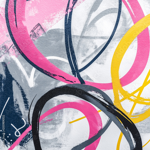 Abstract colorful painting featuring bold circular shapes in pink, yellow, and blue against a textured gray background, showcasing modern artistic expression