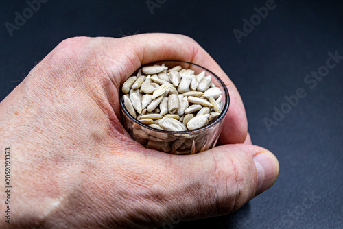 beautiful texture ripe of natural sunflower seeds on background