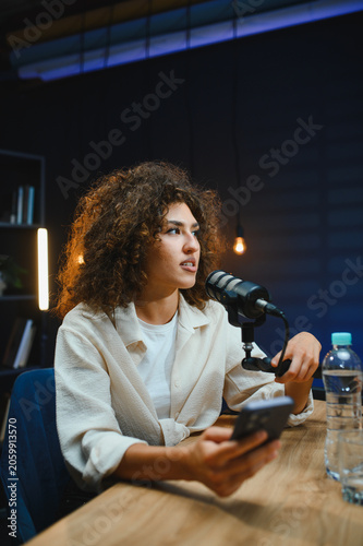Принти на полотні Content creator recording podcast in professional studio