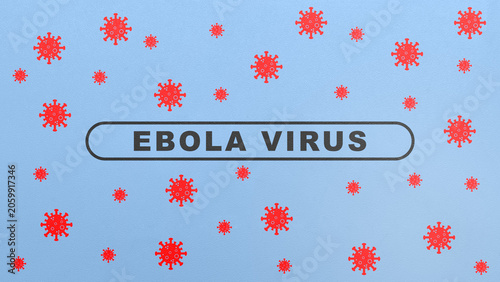 Graphic illustration of the Ebola virus featuring stylized red pathogen structures scattered across a blue background with the text Ebola Virus centered in a rectangular frame