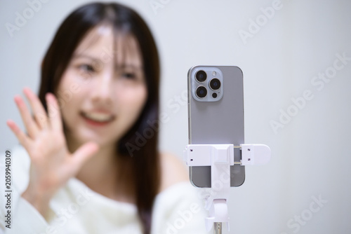 Foto ライブ配信をする日本人女性