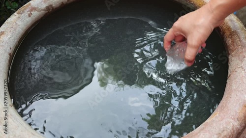 Adding alum to water for removes the suspended clay particles from water.
