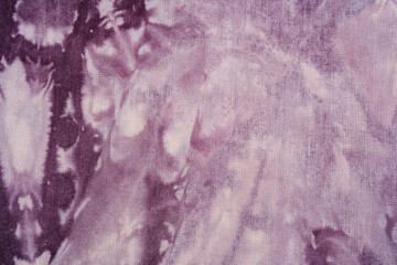 Close up of purple tie dye fabric texture