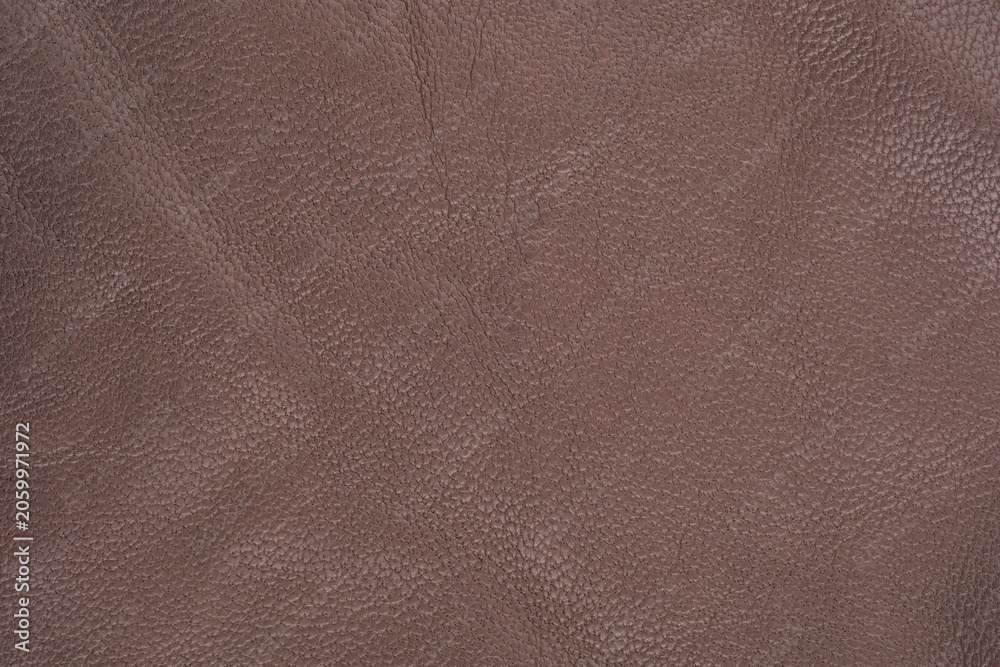 Fototapeta premium Brown leather fabric with a textured surface