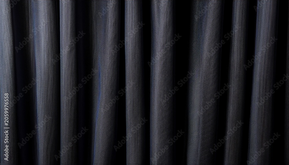 Obraz premium Soft Black Curtain Folding Vertically From Top To Bottom Close Up