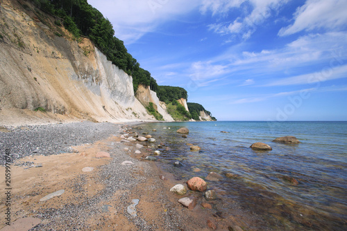 View of the rocky hiking trail and the chalk cliffs in Jasmund National Park on the island of Rügen, Baltic Sea – Germany, 2026