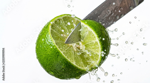 Fresh Green Lime Slice with Water Drops Isolated on White Background Healthy Citrus Fruit Full of Vitamin C and Juicy Refreshment