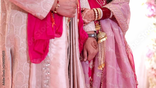 Closeup Shot of Indian Bride and Groom Holding Hands